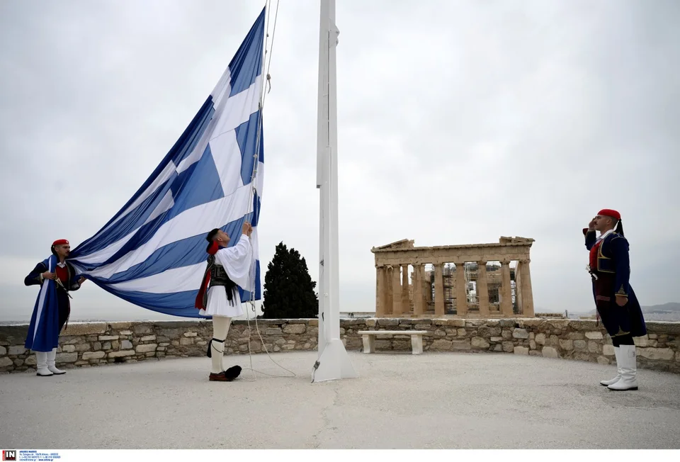 a man holding a flag